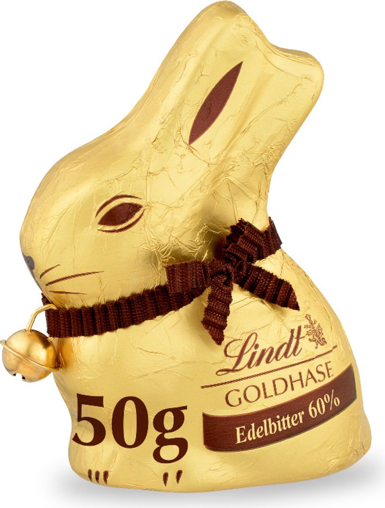 A Lindt Goldhase chocolate bunny wrapped in gold foil, wearing a brown ribbon and bell.
