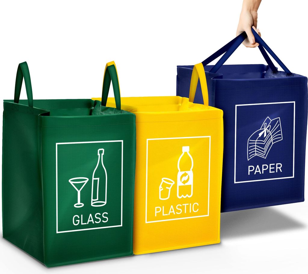 Three recycling bags for sorting waste.