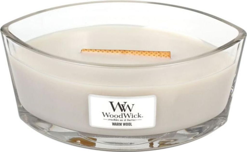 A close-up studio shot of a WoodWick candle in a clear glass container.