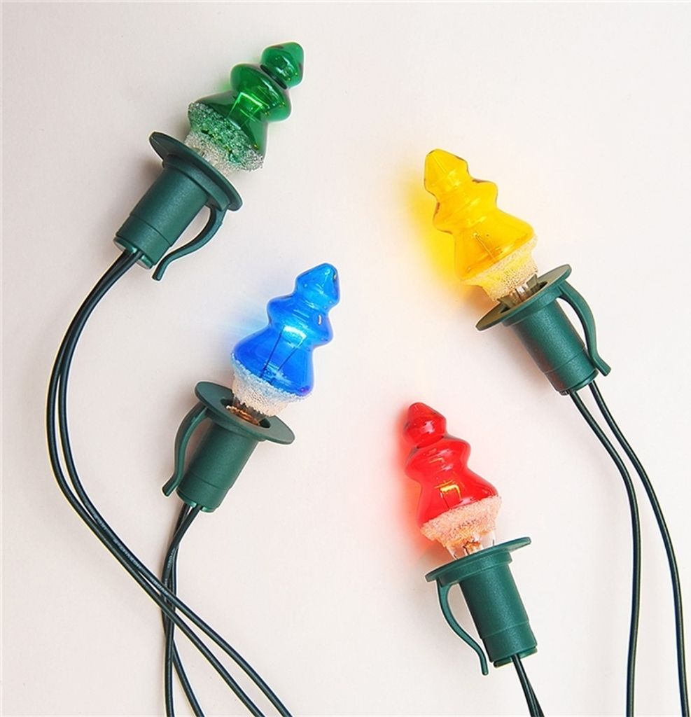 Four Christmas lights shaped like trees in different colors (green, blue, red, yellow) are arranged on a white background.