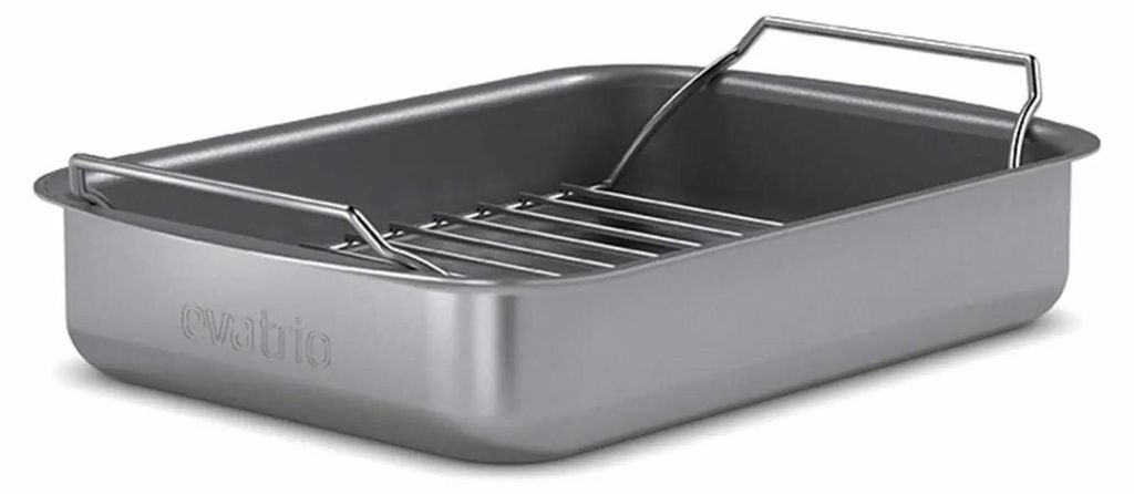 A roasting pan with a rack inside, shown from a diagonal angle.