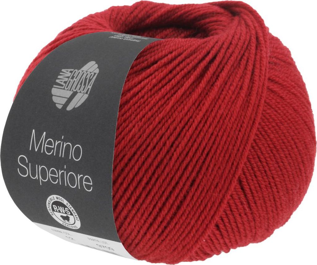 A ball of red yarn with a label.