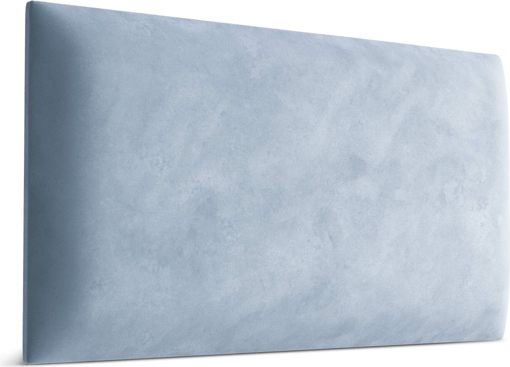 A close-up, side view of a light blue upholstered headboard.