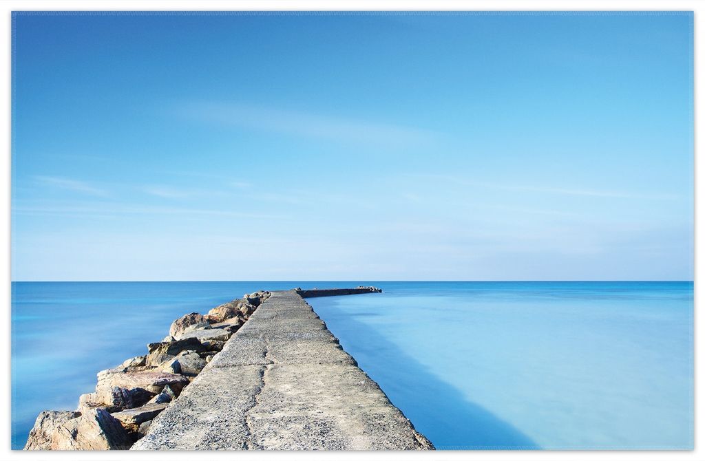 Wallario Premium Teppich, Größe 90 x 140 cm, Pier am blauen Ozean mit blauem Himmel