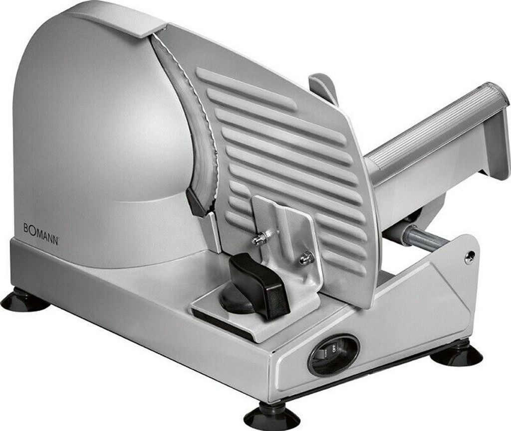 A silver electric slicer with a ribbed cutting guard and a black adjustment knob sits on a white background.