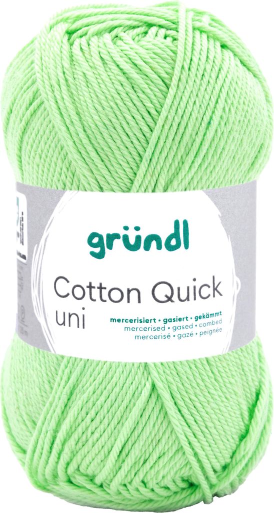 A ball of green yarn with a label.