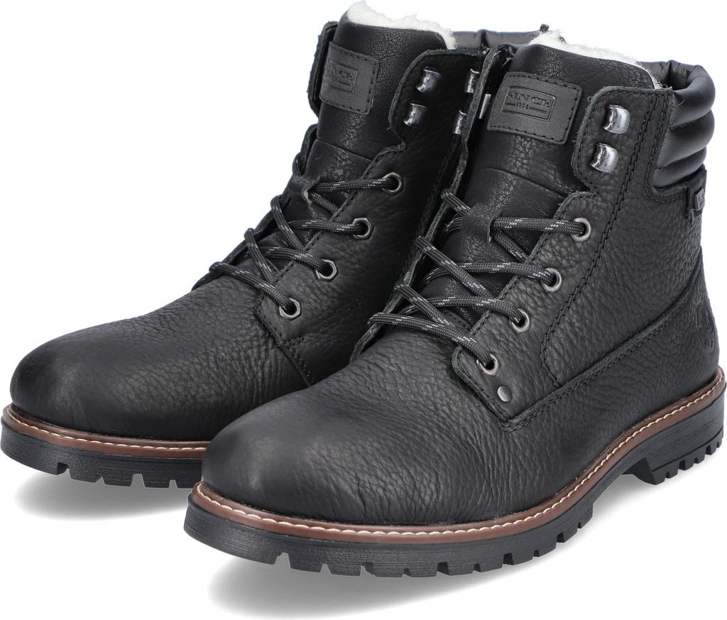 A pair of black leather boots on a white background.