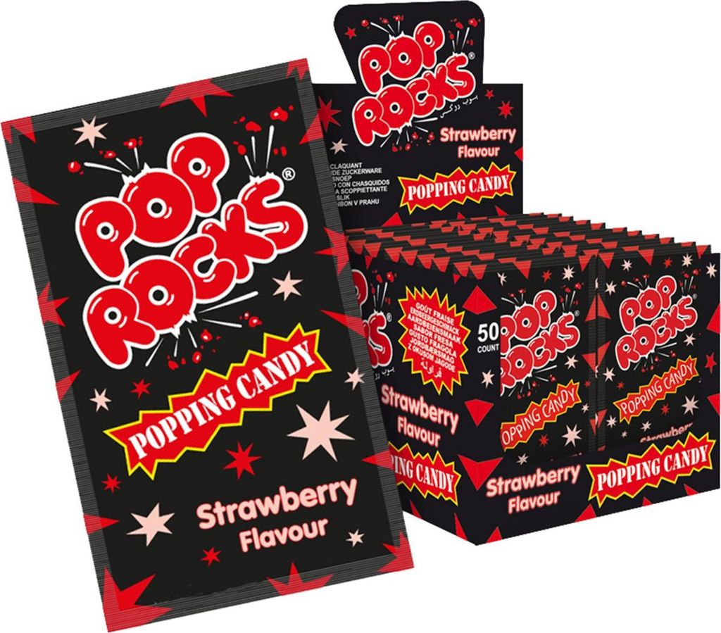 A display box of Pop Rocks strawberry flavored popping candy, with individual packets visible.