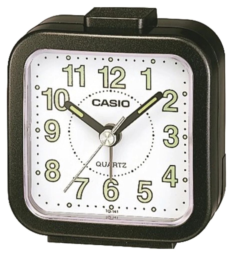 A close-up studio shot of a black Casio analog alarm clock with a white face.