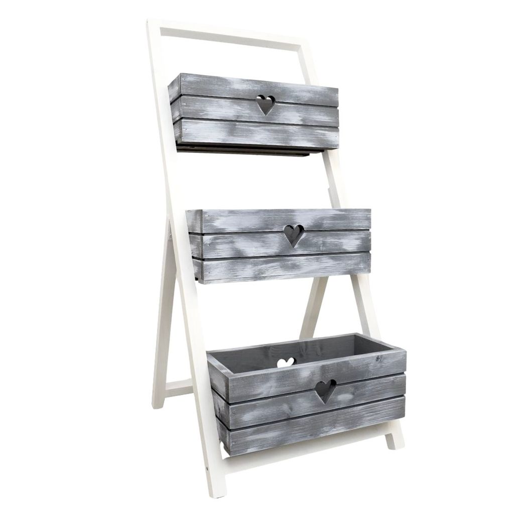 A three-tiered wooden planter stand with gray and white distressed finish.