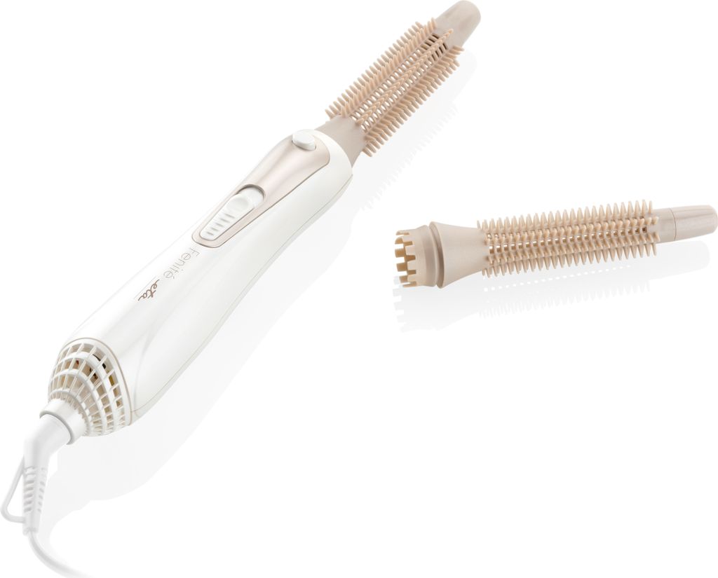 A white and beige hair styling tool with two interchangeable brush attachments, shown on a white background.