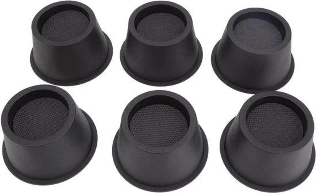 Surélever un canapé trop bas avec ces 6 rehausseurs ronds et noirs