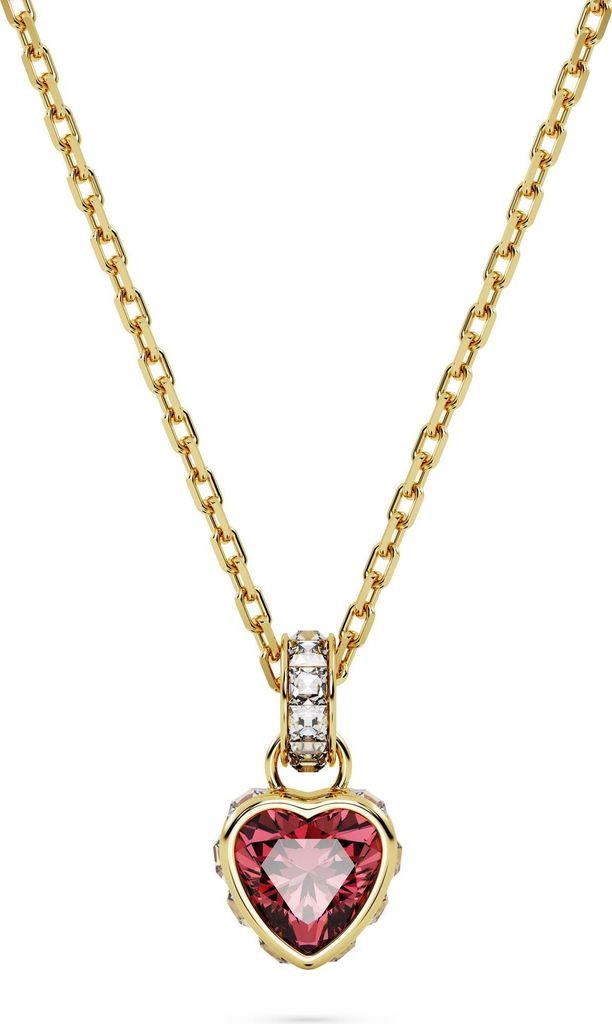 A gold necklace with a heart-shaped red pendant and clear stones.