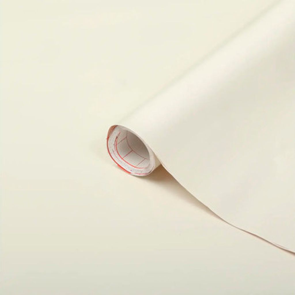 A roll of white adhesive film is shown diagonally on a light background.