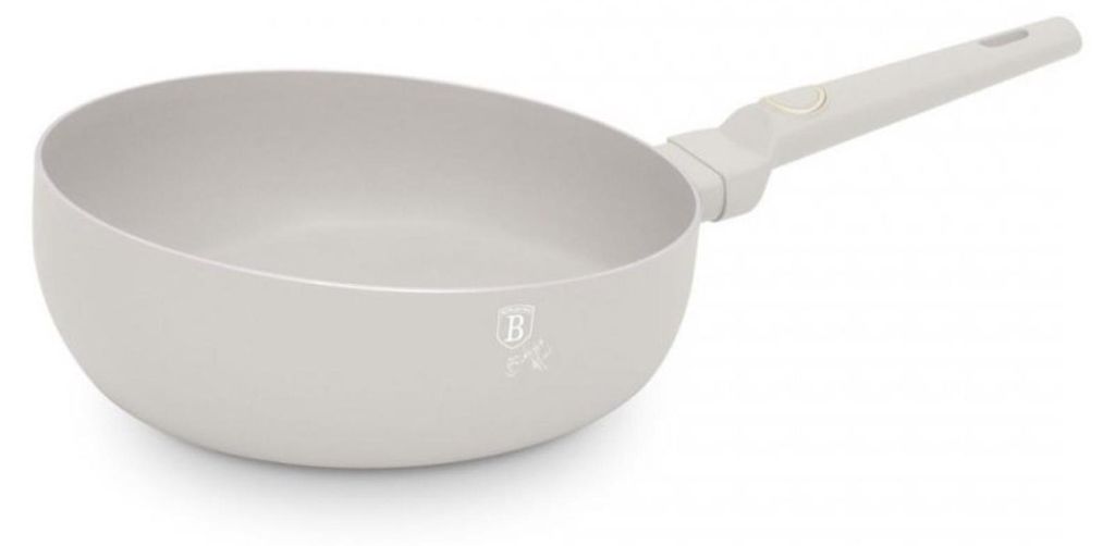 A cream-colored wok pan with a gray handle is shown against a white background.
