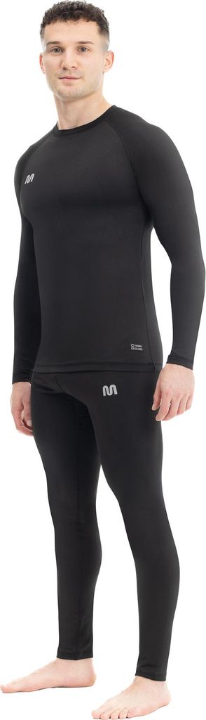 A man wearing a black thermal underwear set.