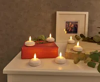 Northpoint LED Outdoor Teelichter 12er-Set Warmweißes Licht mit Flackereffekt IP65 Timerfunktion
