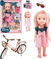 Mädchenpuppe mit Fahrrad