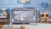 JOY-Reisebett von Kinderkraft rosa