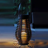 Nino Leuchten Solarlaterne Trapani schwarz 1 flammig Kerze Creme Flackereffekt