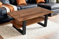 Couchtisch Baumkante massiv Mangoholz honigfarben 115×65 cm schwarz PATRICK