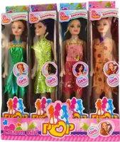 Puppe mit Kleid in Sichtbox - im Display