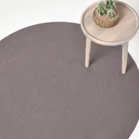 HOMESCAPES Handgewebter geflochtener Teppich in Grau, 120 cm rund