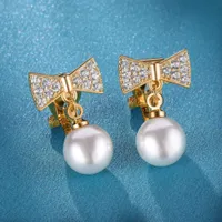 Mode-Bowknot-Form-Strass-Imitat-Perlen-eingelegte Ohrclips-Frauen-Ohrringe