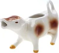 Milchkännchen Sahnekuh Sahnekännchen als braun weiße Kuh H.: 10cm L.: 15cm Fassungsvermögen: 100ml