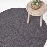 HOMESCAPES Geflochtener handgewebter Teppich in grau und schwarz, 120 cm rund