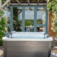 sweeek - Fester Whirlpool 6 Personen Hydromassage, 4 Kissen + Abdeckplane inbegriffen - Grau