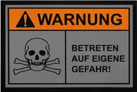 Fußmatte mit Spruch Warnung Betreten auf eigene Gefahr Totenschädel Ironie rutschfest & waschbar Moonworks® schwarz 60x40cm