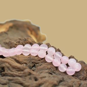 1 Strang Hochwertige, synthetische Rosenquarz Perlen, 6 mm auf Strang