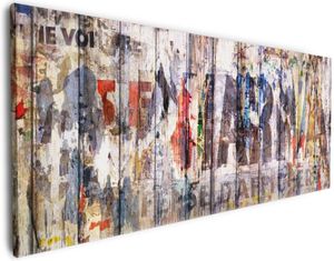 Wallario Premium Leinwandbild Bemalte Holzplanken mit alter Schrift in Größe 50 x 125 cm