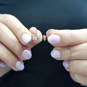 Ohrstecker mit Diamanten in Baguett und Brilliantschliff 14 Karat Rotgold