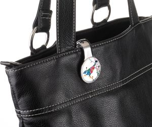 Handtaschenhalter und -clip BIRDIE Handtaschenhalter und -clip BIRDIE