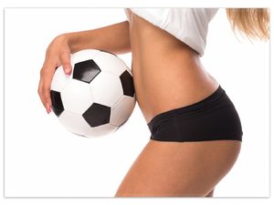 Wallario Premium Teppich, Größe 50 x 70 cm, Fußball - sexy Frau mit einem Fußball