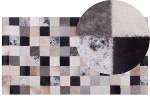 BELIANI Teppich Braun mit Beige Kuhfell rechteckig 80 x 150 cm Kurzflor Patchwork geometrisches Muster Kariert Wohnzimmer Schlafzimmer Esszimmer