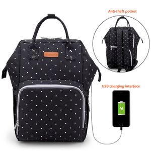 Vodotěsné stylové velkokapacitní multifunkční cestovní mateřské dětské přebalovací tašky s USB nabíjecím portem - černé tečky