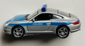 Welly Porsche 911 Polizei, blau/silber mit Rückzugmotor