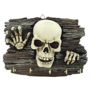 Schlüsselbrett Skelett kommt aus Mauer Figur Totenkopf Schädel