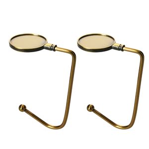 kwmobile 2x Tisch Handtaschenhalter Haken - Antirutsch Taschenhaken Halterung Handtaschen - Taschenaufhänger Halter in Bronze