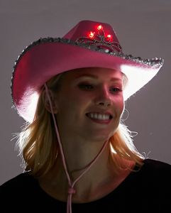 Pinker Cowgirl Hut mit Leuchtfunktion als Kostümaccessoire für Karneval