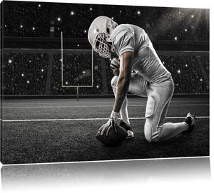 knieender Football-Spieler B&W Detail, Format: 100x70 auf Leinwand, XXL riesige Bilder fertig gerahmt mit Keilrahmen, Kunstdruck auf Wandbild mit Rahmen, er als Gemälde oder Ölbild, kein Poster oder Plakat