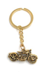 Onwomania Schlüsselanhänger goldenes Motorrad bike Metall Anhänger Charm