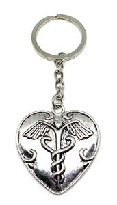 Onwomania Schlüsselanhänger Herz Gesundheit Apotheke Logo Silber Metall Anhänger Charm