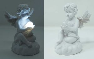 Engel Deko Figur mit LED Engelchen mit Glitzerkugel Skulptur Putten Schutzengel