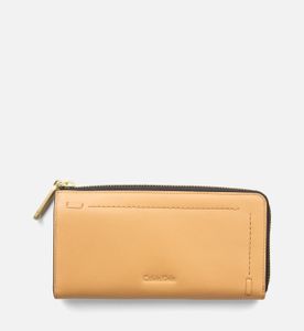 Peněženka Calvin Klein LARGE LEATHER ZIP-AROUND WALLET písková