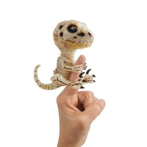 WowWee Fingerlings Ungezähmtes interaktives Spielzeug - Raptor Gloom-Skelett leuchtet im Dunkeln