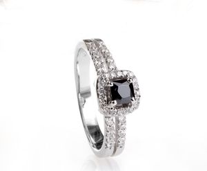 Karisma Damen Silber 925 Ring Rhodiniert Gefasste Zirkonia Steine Weiss Schwarz - CR21886 Karisma Damen Silber 925 Ring Rhodiniert Gefasste Zirkonia Steine Weiss Schwarz - CR21886